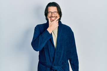 Sticker - Middle age caucasian man wearing bathrobe and glasses looking confident at the camera smiling with crossed arms and hand raised on chin. thinking positive.