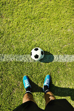Ready For Kick-off. POV Shot Of A Soccer Player Standing On The Field.