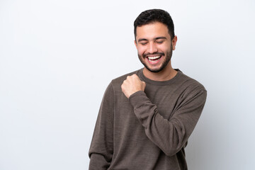 Wall Mural - Young Brazilian man isolated on white background celebrating a victory