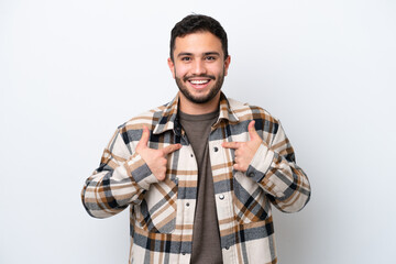 Wall Mural - Young Brazilian man isolated on white background with surprise facial expression