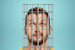 © Aliaksandr Marko - Head of a businessman in a cage. Opportunities are limited, business metaphor, a prison for the mind.