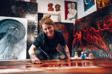 Female Painter Artist Painting And Creating Her Art In A Creative Studio