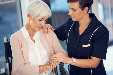 Sticker - Things will get better soon. Cropped shot of a young female nurse consoling an aged woman sitting in a wheelchair in a nursing home.