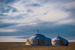 © Cavan Images - motorcycle parked at Mongolian Ger or Yurt in the Gobi desert