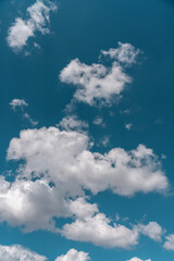 Wall Mural - Bright white clouds floating on blue sky