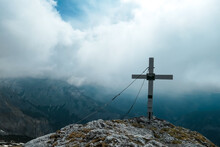 Scenic View From The Summit Cross Of Mount Zinken In The Hochschwab Region, Upper Styria, Austria. Valley Is Covered With Clouds. Weather Change On Rainy Spring Day In The Alps, Europe. Alpine Terrain