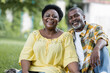 © LIGHTFIELD STUDIOS - smiling and senior african american couple looking at camera.