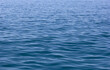 © Pattern_Repeat - Water texture. Ocean, lake, river, open sea, high seas. Image that conveys peace, tranquility, serenity. Blue, light and shadow. Backdrop, background. Wallpaper.