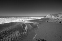 Sea Foam On Bright Sunny Day On Moonstone Beach In Cambria California United States - Black And White