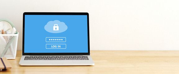 Laptop computer with cloud data storage password login on screen, cyber security concept