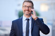 © Michael C/peopleimages.com - Ill meet you at the office in ten. Cropped shot of a handsome mature businessman making a call while standing outside in the city.