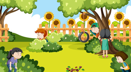 Wall Mural - children playing hide and seek at the park