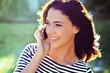 © Arcurs Co-op/peopleimages.com - The perfect time to chat. Shot of a gorgeous young woman on the phone while outside.