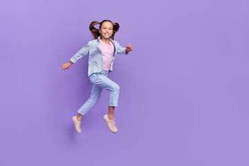 Poster - Photo of funky cute little school girl wear denim shirt jumping high running fast empty space isolated purple color background