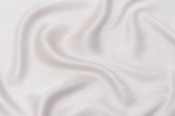 Wall Mural - Abstract and soft focus wave of white or ivory fabric background, white ivory texture and detail