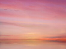 Pink Sunset At Sea  Water Reflection Sun Light On  Gold Yellow  Clouds Sky  Nature Background