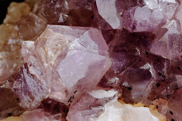 Raw amethyst close-up blurred background