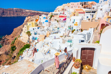 Wall Mural - Family on vacation in Oia village