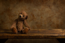 Brown Teddy Bear On Wooden Shelf