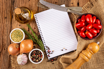 Cookbook with ingredients on the table.Recipe book.