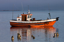 Fish Red Boat In Patagonia In Chilean Coast. High Quality Photo