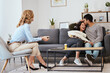 © Siphosethu Fanti/peopleimages.com - Smile, its free therapy. Shot of a happy couple at a therapy session.
