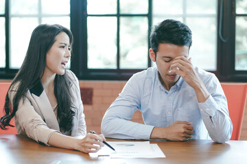 Angry boss scolding rebuking incompetent office worker intern dissatisfied team leader shouting pointing finger make pressure and stress as loss profit