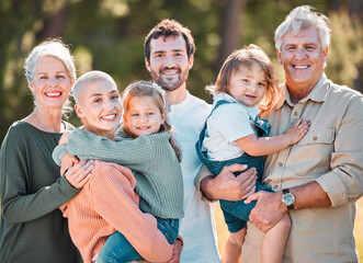 Wall Mural - This is all of us. Shot of a multi-generational family posing together outdoors.