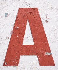 The letter A is red on a white background