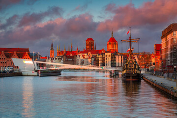 Wall Mural - Beautiful architecture of Gdansk old town reflected in the Motlawa river at sunrise, Poland