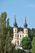 The Onion Domed Church On The Hill, Rises Out Of The Forest Along The Main River In Germany.