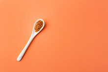 Sinapis Alba - Organic Mustard Seeds In The Ceramic Spoon
