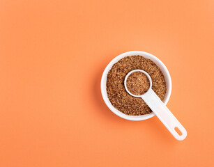 Sticker - Crushed flax seeds in the bowl - Linum usitatissimum