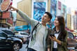 © Kawee - Asian attractive romantic couple travel in the city for honeymoon trip