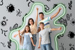 Healthy family with strong immunity on grey background. Protection against germs, bacteria and viruses