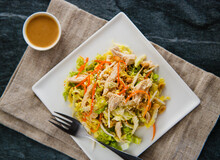Asian Sesame Chicken Salad With Carrots And Ginger Dressing.