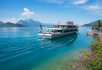 passenger liner at lake Thunersee, landing stage Beatenbucht, boat trip in switzerland