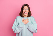 Photo Of Youth Adorable Lady Arms On Chest Satisfied Sincere Thankful Trust Isolated Over Pink Color Background