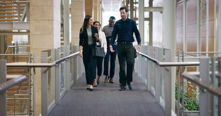 Poster - The only way to run a business, is together. Diverse group of  business people walking in the hallway of a modern office. Multiethnic employees taking a walk at a conference with career growth concept