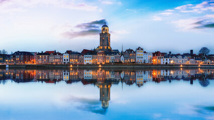 Wall Mural - View of Deventer city with the reflection on the water surface. Overijssel, Netherlands.