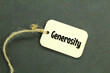 wooden tags are tied with the word generosity
