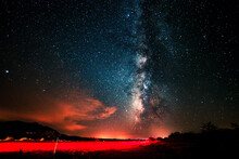 Silhouette Of A Starry Night Sky With Milky Way During Sunset Over A Landscape