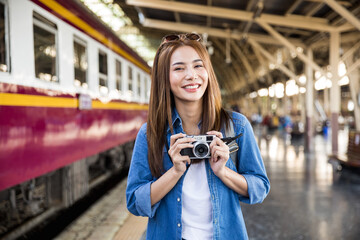 Wall Mural - Young Asian lady backpacker