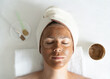 © Marina - Applying facial mask at woman face at beauty salon
