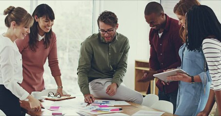 Aufkleber - Everyones input counts. 4k video footage of a group of young work colleagues having a meeting and discussing work related issues in the office together.