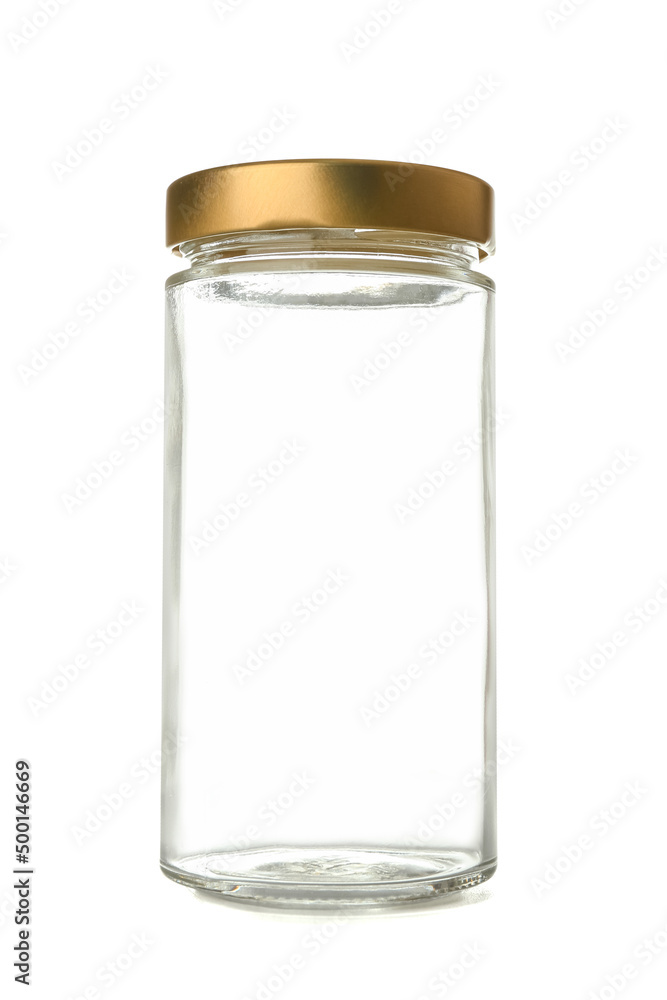 Glass jar with golden cap isolated on white background