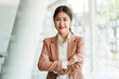 Young Attractive Start up business woman Asian people looking to camera, arm crossed.