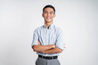 © Odua Images - asian young man smiling with hands crossed on isolated background