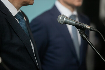 Wall Mural -  Politician or businessman is giving a speech