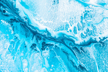 Wall Mural - Liquid art texture with pouring colors. Fluid backdrop with flows and cells, waves. Abstract background with splatter inks. Blue colors mixes on macrophotography picture.